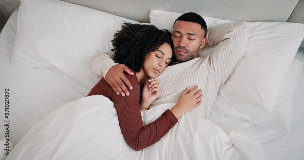 Relax, sleeping and couple with hug in bed for rest, blanket and cozy morning in bedroom. Top view, love and tired man with woman on lazy weekend for dreaming, fatigue or comfortable break in home Relax, sleeping and couple with hug in bed for rest, blanket and cozy morning in bedroom. Top view, love and tired man with woman on lazy weekend for dreaming, fatigue or comfortable break in home