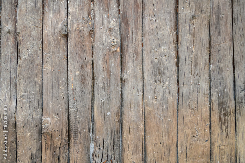 The wooden panel has a beautiful dark pattern, hardwood floor texture The wooden panel has a beautiful dark pattern, hardwood floor texture