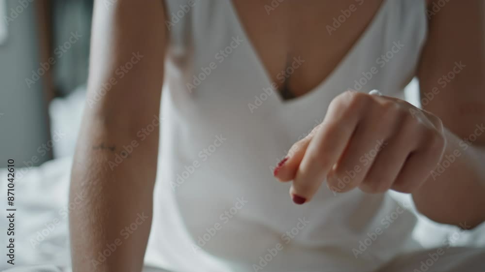 Closeup hands rubbing cream on arm skin. Woman applying nourishing cosmetics Closeup hands rubbing cream on arm skin. Woman applying nourishing cosmetics