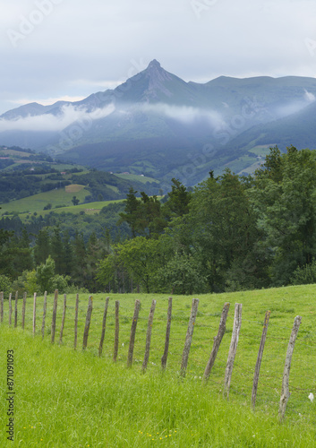 Mount Txindoki from Lazkaomendi. Meadows in Lazkaomendi with Mount Txindoki in the background, Euskadi photo