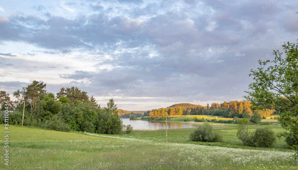 A beautiful, serene landscape with a river running through it A beautiful, serene landscape with a river running through it