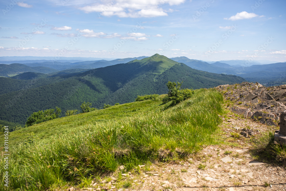 View of the Bieszczady Mountains from Połonina Wetlińska. Summer in the Bieszczady mountains. Polish Mountains. View of the Bieszczady Mountains from Połonina Wetlińska. Summer in the Bieszczady mountains. Polish Mountains.