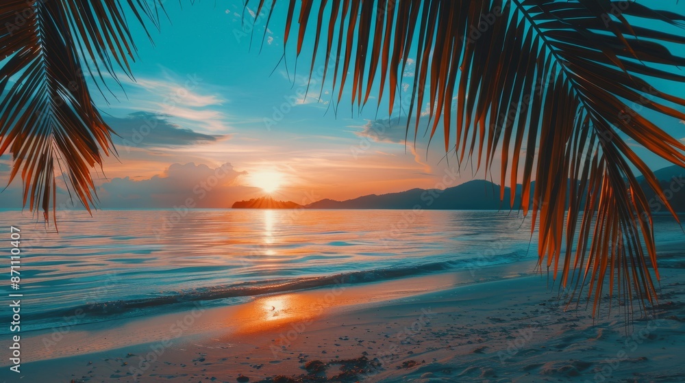 Fototapeta premium Panoramic sunset view of the beautiful coast, with turquoise sea next to fine sandy beaches and palm trees