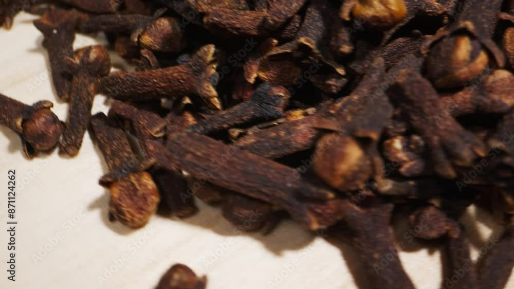 Carnation spice macro close-up. Collection. Dry spice cloves. Selective focus.Spice for food and drinks Carnation spice macro close-up. Collection. Dry spice cloves. Selective focus.Spice for food and drinks