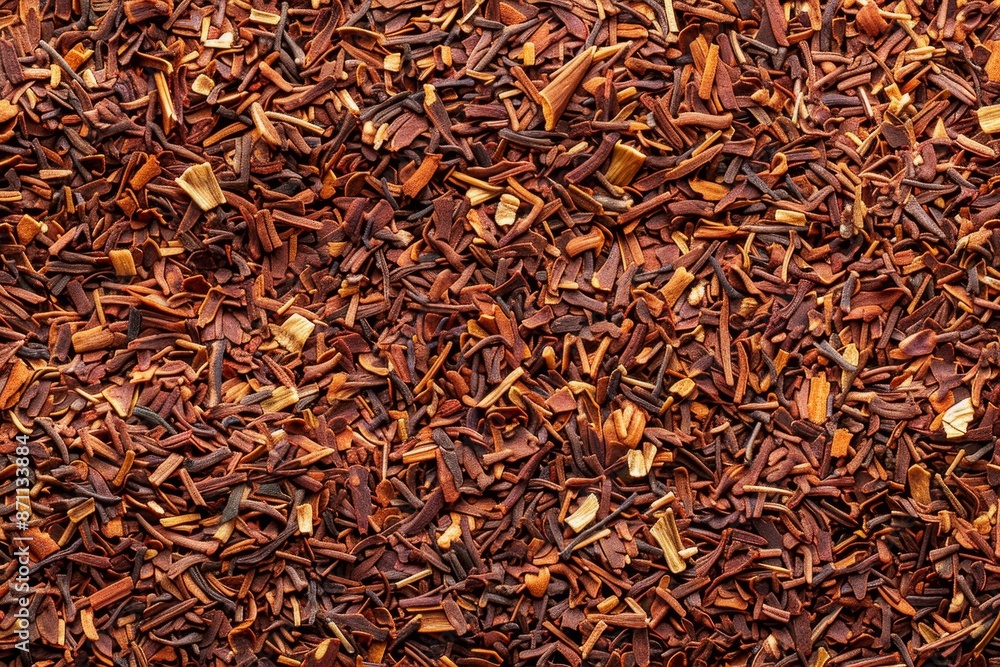 Close up of dried rooibos tea leaves from South Africa for background Close up of dried rooibos tea leaves from South Africa for background