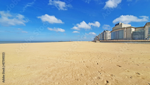 Konstfotografi Beautiful beach with much sand, sky and hotel.