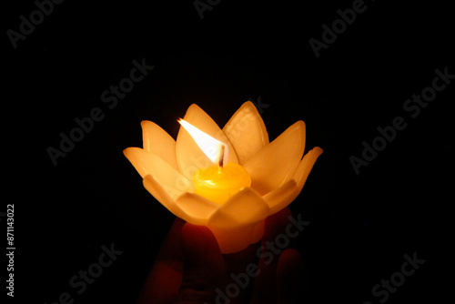 Person holding Krathong photo