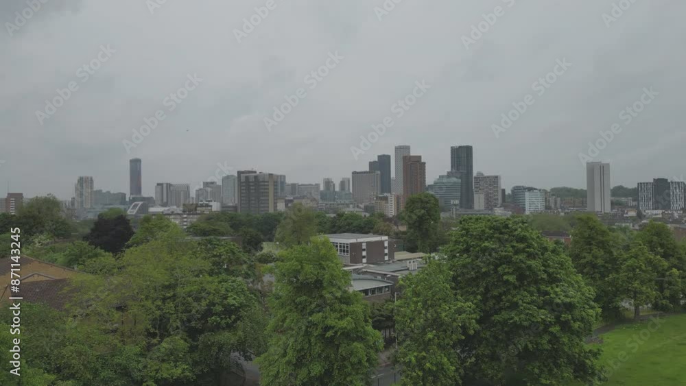 A drone ascending from a park in central London. A drone ascending from a park in central London.
