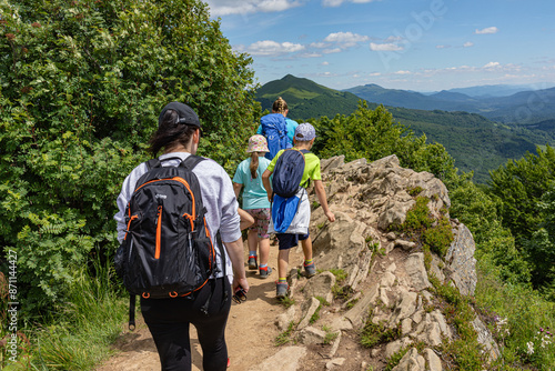 Fototapeta Naklejka Na Ścianę i Meble -  Hiking in the Bieszczady mountains. Mountain walking. Summer in the Bieszczady mountains. Polish Mountains.