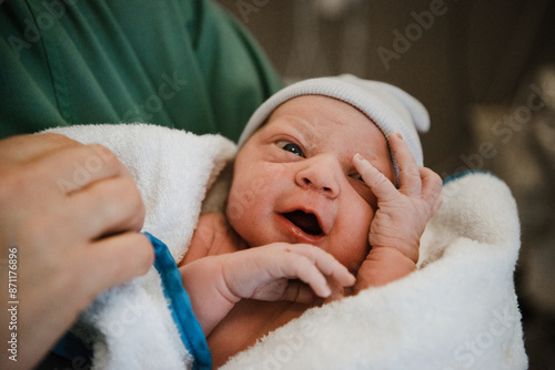 Newborn baby with mother in hospital