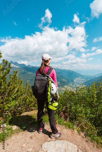 Woman Hiker Standing on a Cliffin the Swiss Mountain Landscape Like a Hero