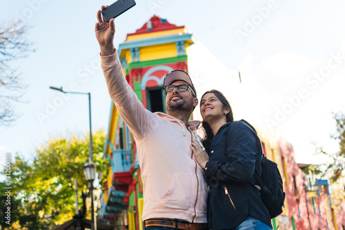 Tourists taking selfie at Caminito photo