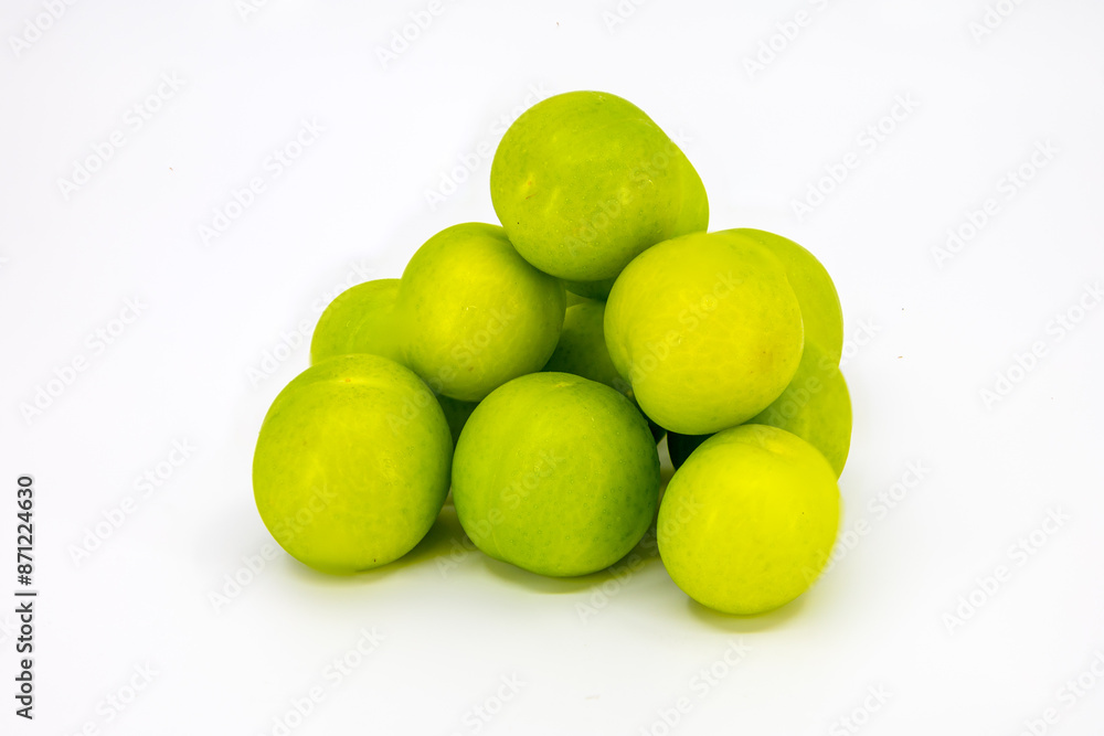 Stack of Fresh Green Plums on White Background Stack of Fresh Green Plums on White Background