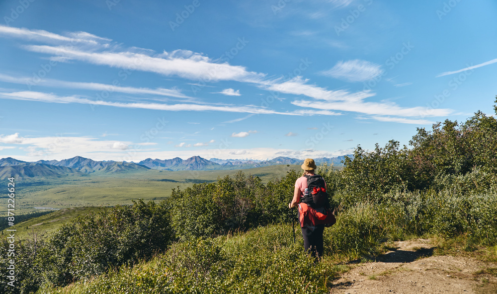 Hiker and Alaska valley Hiker and Alaska valley