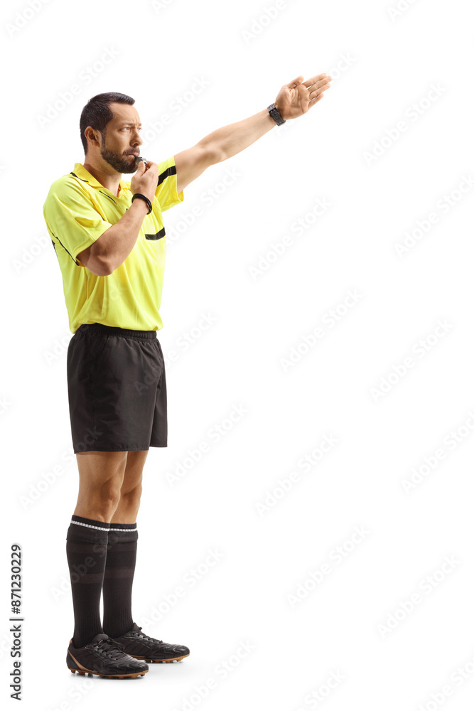 Football referee blowing a whistle and showing offside Football referee blowing a whistle and showing offside