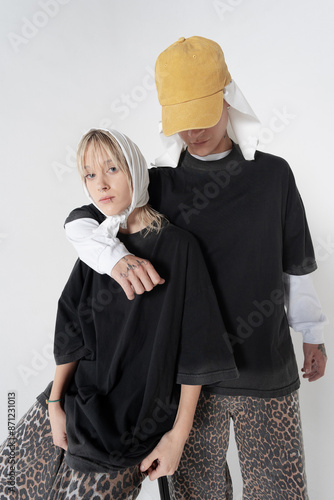 Couple in fall cloths in studio. Studio portrait photo