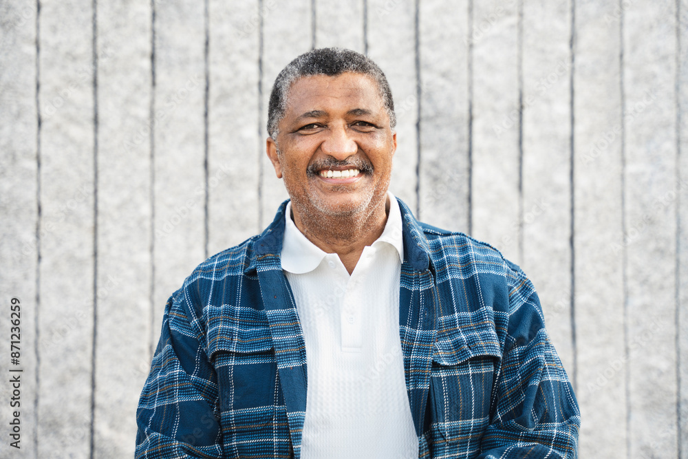 Portrait of Senior man laughing in the street Portrait of Senior man laughing in the street