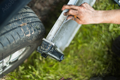 Outdoor Garage Work Repairing Car Parts  photo