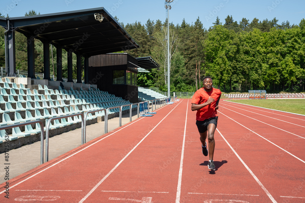 Black Athlete Running In Stadium Black Athlete Running In Stadium