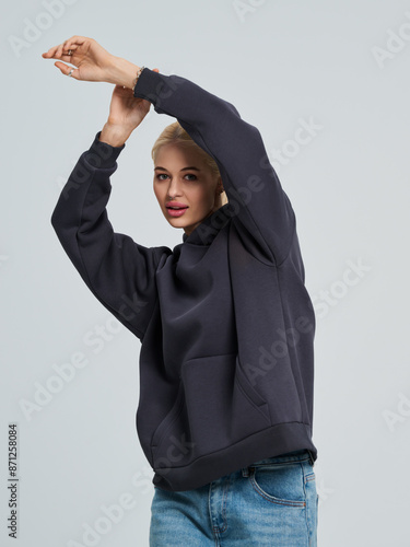 Beautiful girl model in casual clothes. Studio shot on a white background. 