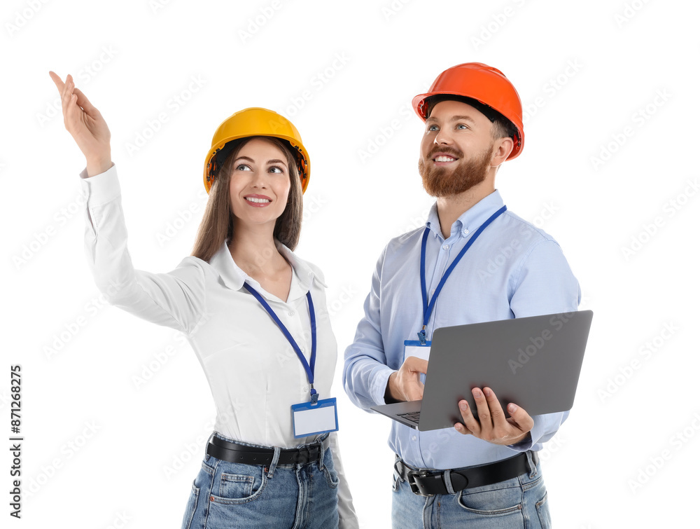 Engineers in hard hats with laptop on white background Engineers in hard hats with laptop on white background