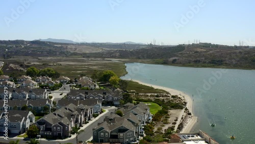 Aerial view of Coronado golf course in San Diego with luxury homes and views of the bay and Pacific Ocean photo