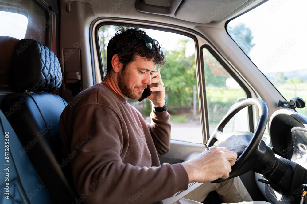 Delivery man working with his van Delivery man working with his van