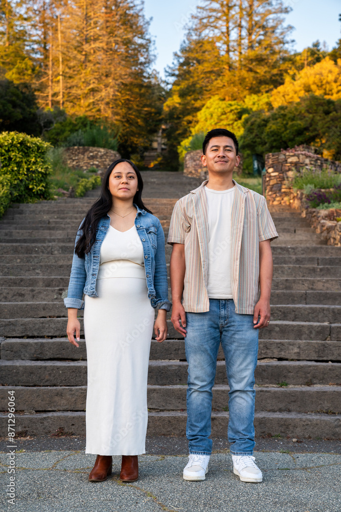 Two people standing side by side Two people standing side by side