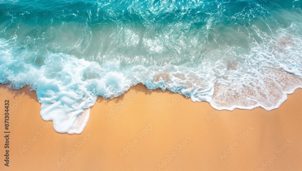 A top view of the sea, waves gently lapping at golden sand and crystal clear turquoise water, creating a serene scene. The camera is positioned directly above to capture the beauty of nature A top view of the sea, waves gently lapping at golden sand and crystal clear turquoise water, creating a serene scene. The camera is positioned directly above to capture the beauty of nature