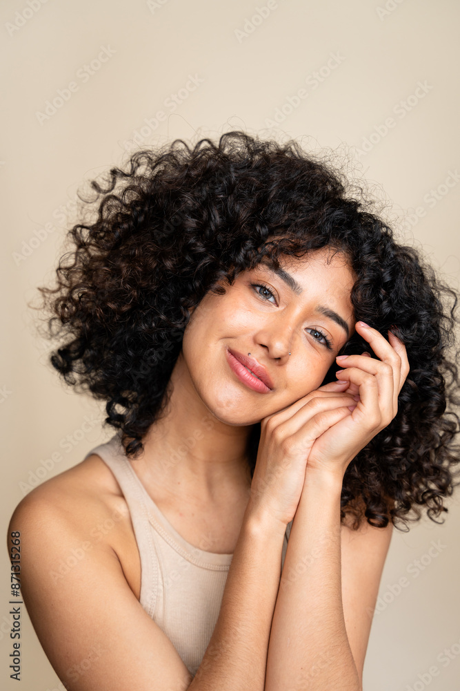 Joyful woman with curly hair posing Joyful woman with curly hair posing