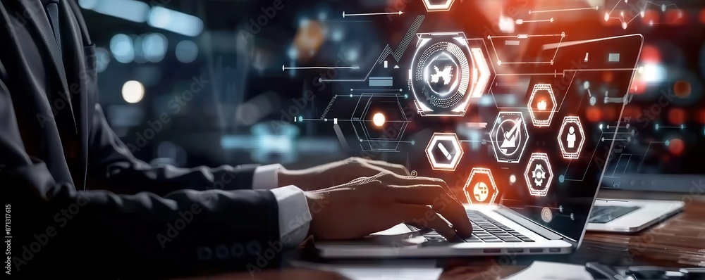 Businessman on laptop with strategy icons, futuristic dark setting, illuminated hexagons, innovation. Businessman on laptop with strategy icons, futuristic dark setting, illuminated hexagons, innovation.