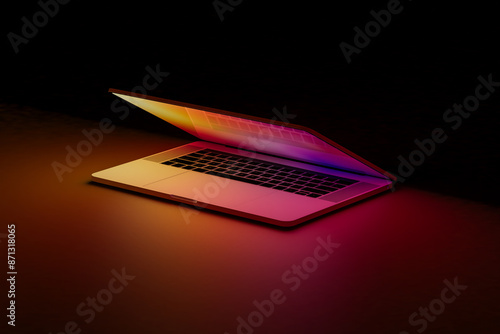 Illuminated laptop screen in dark room, concept of technology