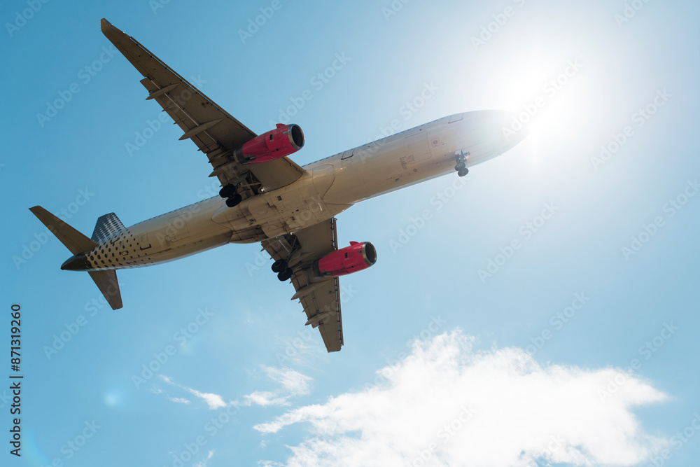 Big airplane landing from below Big airplane landing from below