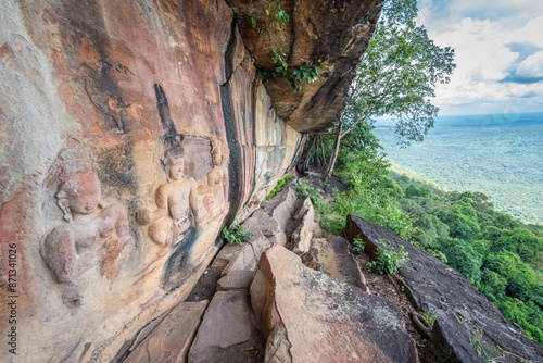 Bas-relief sculptures on the cliffs have an age of about 1500 years, and bas-relief sculptures located at Pha Mor E Daeng, Khao Phra Wihan National Park, Si Sa Ket, Thailand photo