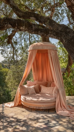 Luxurious outdoor daybed under tree canopy in sunlit garden, relaxation and nature retreat concept photo