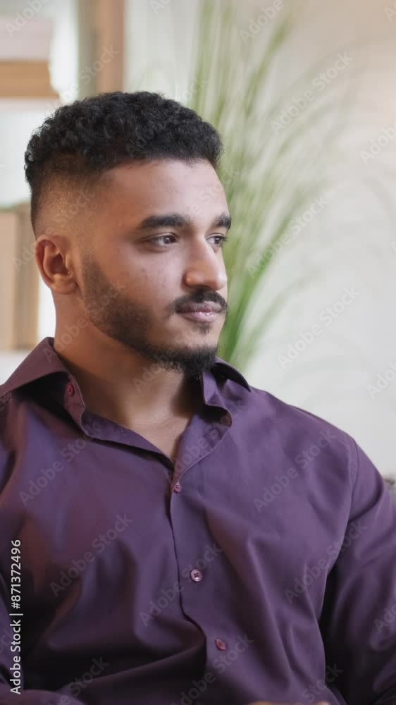 Vertical video. Morning coffee. Home rest. Weekend relaxation. Pensive thoughtful daydreaming man drinking hot beverage from mug alone. Vertical video. Morning coffee. Home rest. Weekend relaxation. Pensive thoughtful daydreaming man drinking hot beverage from mug alone.