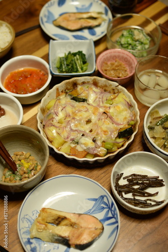 A lot of different dishes arrayed on the dinner table in japan.