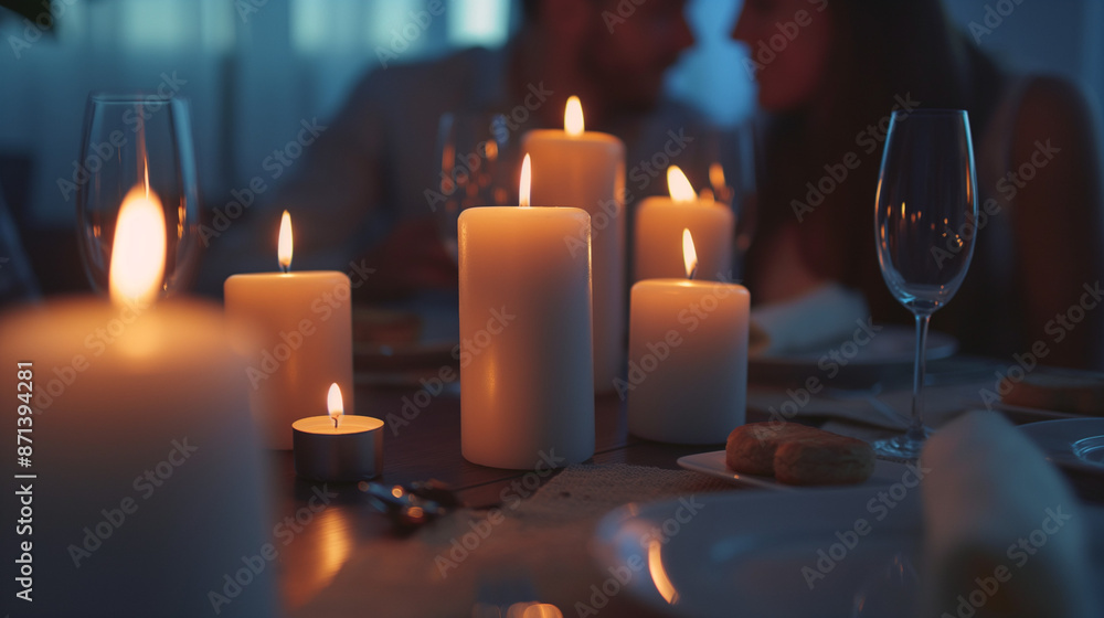 Elegant Dining Table Surrounded by Many Flickering Candles Elegant Dining Table Surrounded by Many Flickering Candles