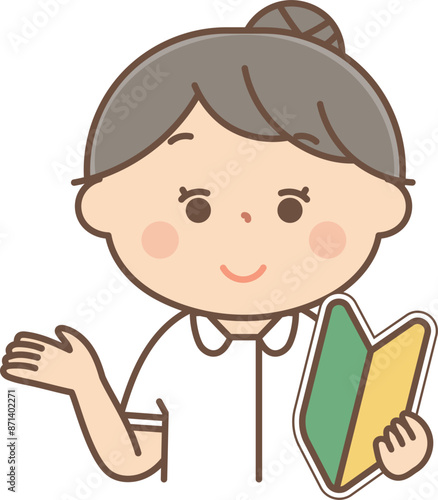 説明をする初心者マークを持った女子看護師