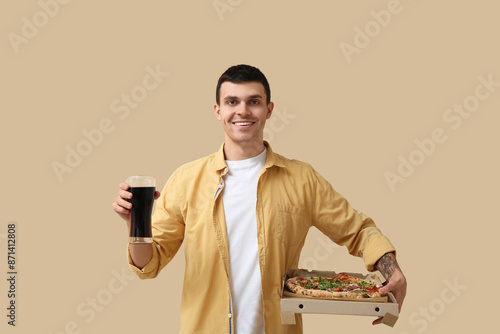 Young man holding cardboard...