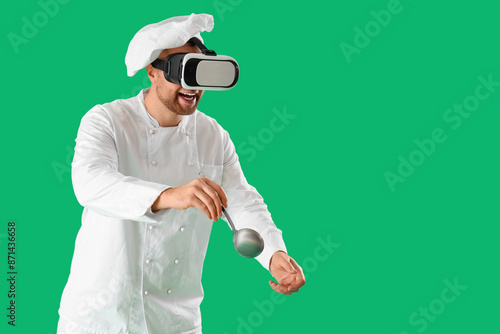 Male chef using VR glasses ...
