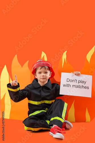 Cute little firefighter hol...