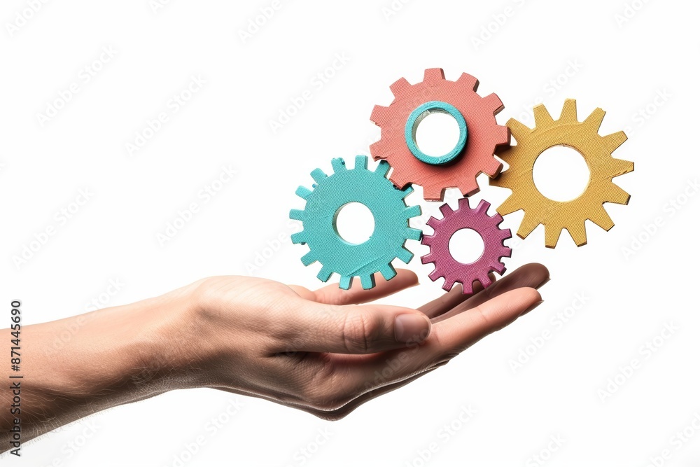 Highlighted in the illustration is a captivating cogwheel, featuring a stunning rainbow shade and intricate detailing, gently grasped by a hand against a plain white background. Highlighted in the illustration is a captivating cogwheel, featuring a stunning rainbow shade and intricate detailing, gently grasped by a hand against a plain white background.