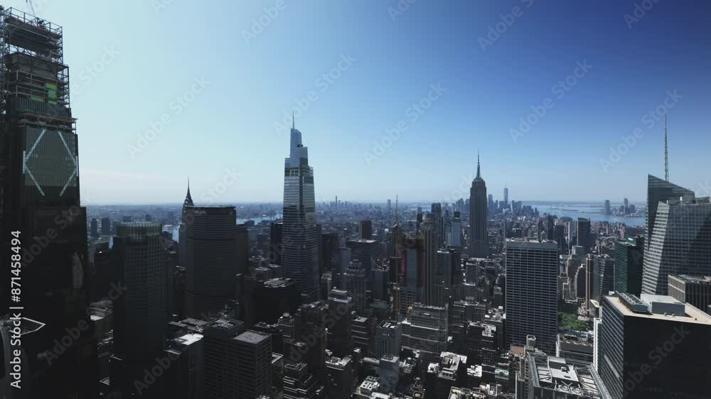 New York City, time-lapse of Manhattan skyscrapers in a sunny day. High angle view. New York City, time-lapse of Manhattan skyscrapers in a sunny day. High angle view.