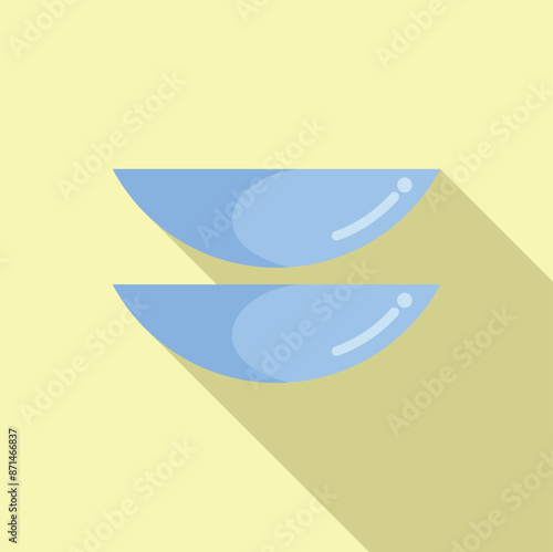 Two blue soft contact lenses are lying on a yellow background, ready to provide clear vision