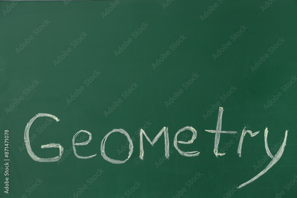 Word GEOMETRY written on green chalkboard Word GEOMETRY written on green chalkboard
