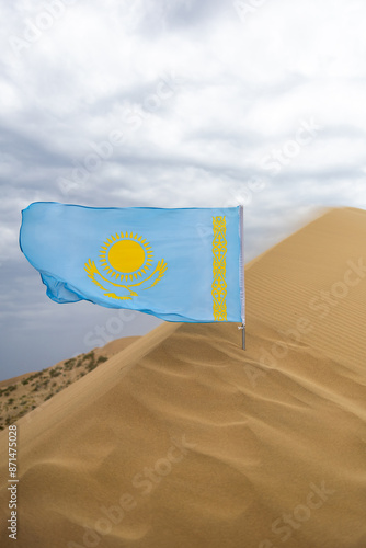 Flag of Kazakhstan in the sand, Singing dunes, Desert, Altyn Emel Nature Park | Флаг Казахстан в песке, Поющие барханы, Пустыня, природный парк Алтын Эмель photo