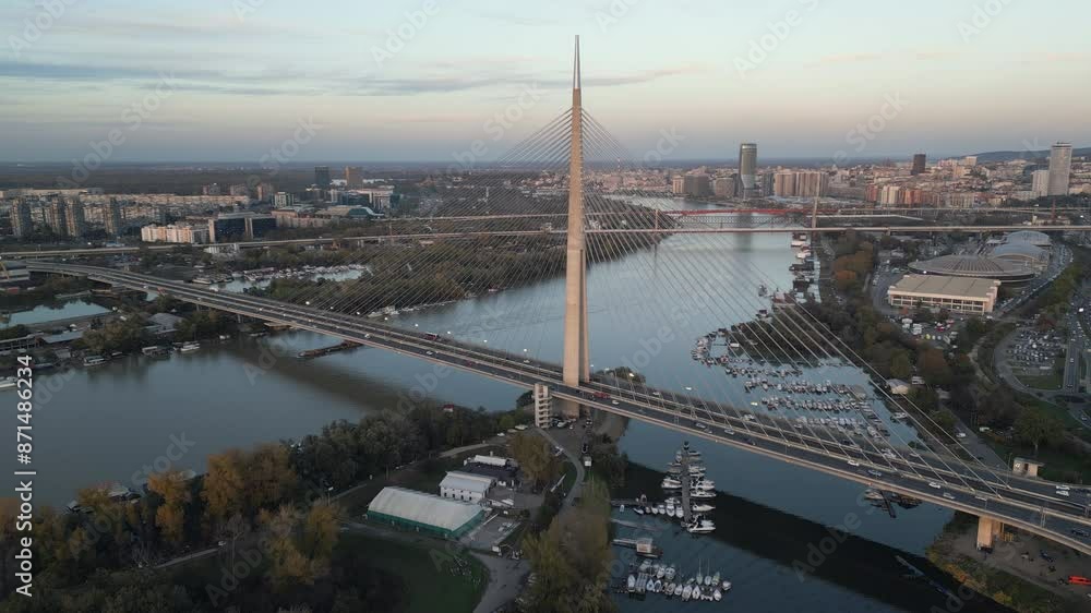 Aerial capture of the Ada bridge at dusk, Belgrade, Serbia. Panoramic view, flying backwards. Aerial capture of the Ada bridge at dusk, Belgrade, Serbia. Panoramic view, flying backwards.