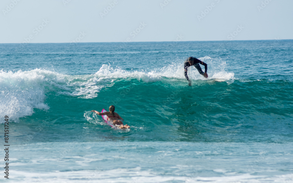 professional surfer riding waves, men catching waves in ocean, isolated. Surfing action water board sport. people water sport lessons and beach swimming activity on summer vacation professional surfer riding waves, men catching waves in ocean, isolated. Surfing action water board sport. people water sport lessons and beach swimming activity on summer vacation