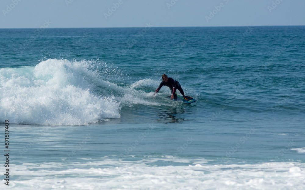 professional surfer riding waves, men catching waves in ocean, isolated. Surfing action water board sport. people water sport lessons and beach swimming activity on summer vacation professional surfer riding waves, men catching waves in ocean, isolated. Surfing action water board sport. people water sport lessons and beach swimming activity on summer vacation